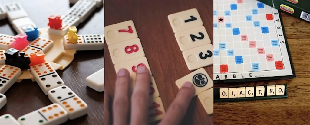 A collage of three classic board games: dominoes with colorful pieces, a hand arranging numbered Rummikub tiles, and a Scrabble board with letter tiles and a tile rack spelling "O, I, A, C, T, R, O.