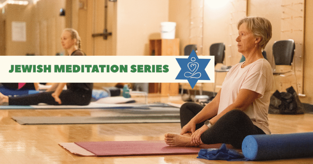 Two people sit cross-legged on yoga mats in a well-lit room, practicing meditation. A banner reads “Jewish Meditation Series” with a blue Star of David and lotus graphic overlaid on the left side.