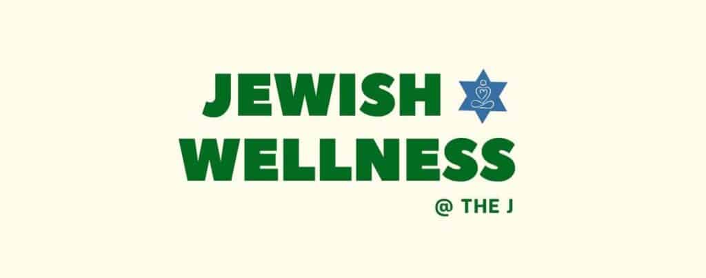 Text reads “Jewish Wellness @ The J.” A blue Star of David with a yoga pose icon inside appears next to the word “Jewish.” The background is light cream.