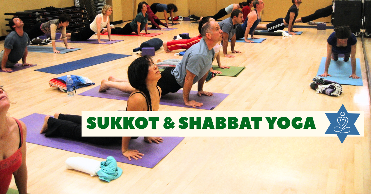 A group of people practicing yoga indoors on mats, doing a cobra pose. Text overlay reads: “Sukkot & Shabbat Yoga” with a small yoga icon.