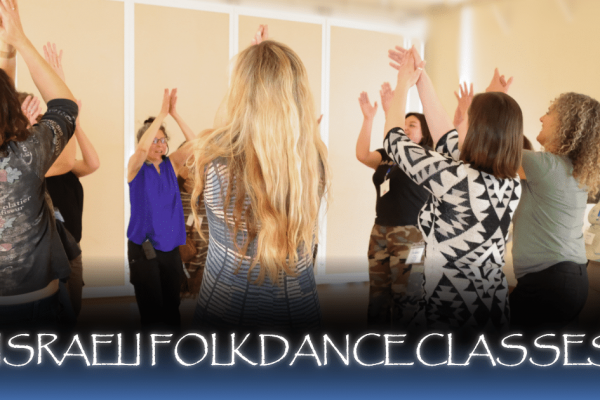 A group of people stand in a circle, raising their arms joyfully during an Israeli folk dance class. Text at the bottom reads "Israeli Folk Dance Classes.